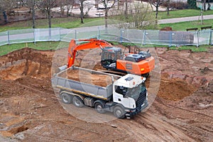 Heavy duty machinery in a construction site for a new residential building in Germany