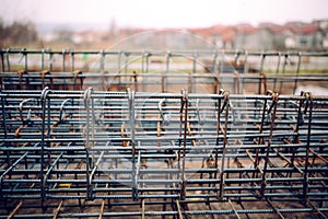 Heavy duty steel bars on construction site, infrastructure details and tools