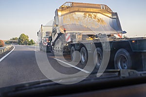 Heavy-duty truck carrying bulldozer