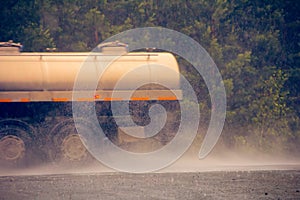 Heavy-duty truck on a wet road