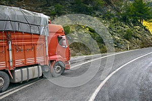 Heavy-duty trucks on a mountain road