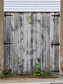 Heavy-duty unpainted wooden shed door abstract background