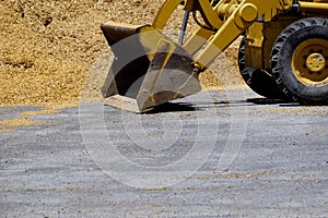 Heavy Equipment Bulldozer Backhoe with Pile of Dirt