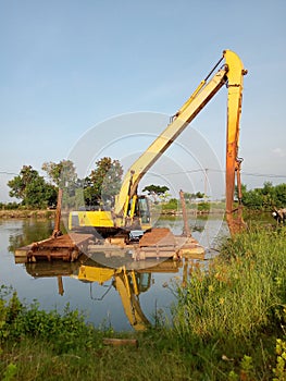 Heavy equipment construction is at the bottom of the river