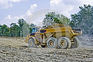 Heavy Equipment Hauling Dirt