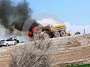 Heavy equipment water truck engine caught on fire from hydraulic leak in engine compartment