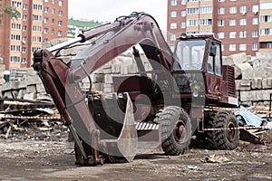 Heavy excavator on the construction site