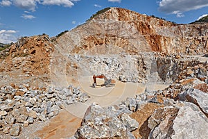 Heavy excavator on a quarry. Excavation machinery. Earthmover work