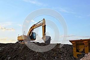 Heavy excavator working at construction site.