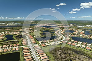 Heavy flood with high water surrounding residential houses after hurricane Ian rainfall in Florida residential area