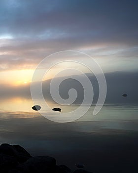 Heavy Fog at Sunset rolling across Georgian Bay near Beausoliel First Nation, Ontario