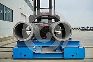 Heavy Forklift loader with concrete pipes