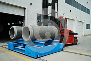 Heavy Forklift loader with concrete pipes