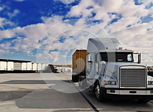 Heavy goods truck leaving loading bay