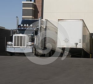 Heavy goods truck at loading bay