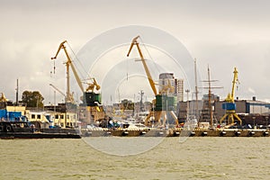 Heavy harbor jib cranes in the Klaipeda Sea Port.