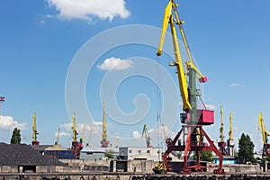 Heavy harbour jib cranes.