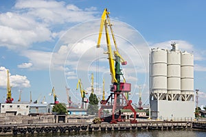 Heavy harbour jib cranes.