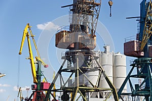 Heavy harbour jib cranes.