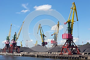 Heavy harbour jib cranes.