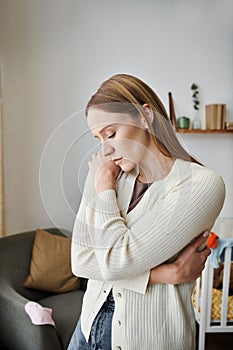 heavy-hearted and withdrawn young woman photo