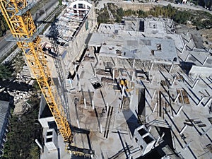 Heavy high tower crane view at skyscraper conctruction site. Industrial building background