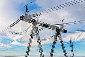 Heavy high voltage electric pylon and power transmission line.