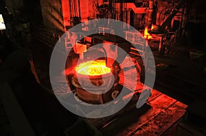 Heavy industry metallurgical plant produces steel in stove
