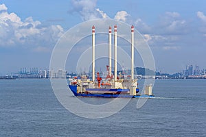 Heavy lift cargo ship transporting an oil rig platform