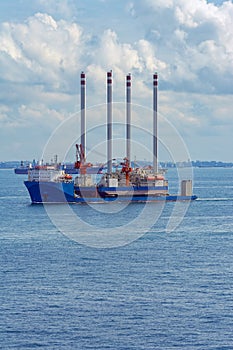 Heavy lift cargo ship transporting an oil rig platform