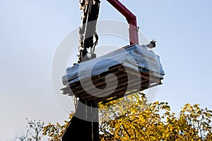 Heavy machinery is used the roof construction material house extension