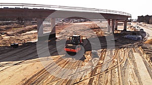 Heavy machinery working on the bridge construction site in Warsaw