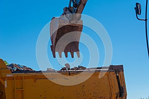 Heavy machinery works at the construction site. Clearing rocky soil for construction in Turkey