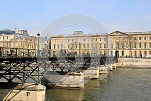 Heavy metal bridge over The Seine, leading to The Louvre, Paris,France,2016