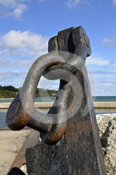 Heavy metal clevis on an old anchor