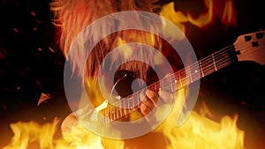 Heavy Metal Guitarist Plays In Raging Fire