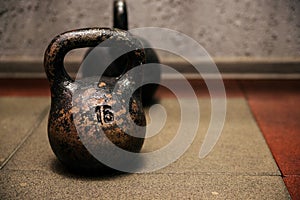 Heavy metal kettlebell in the gym or fitness club. Exercise and a healthy lifestyle