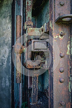 Heavy metal, rusty door to the military facility