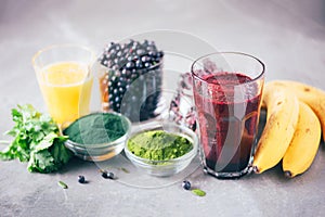 Heavy metals detox smoothie. Blueberries, bilberry, barley grass juice extract, spirulina powder, orange juice, dulse and cilantro