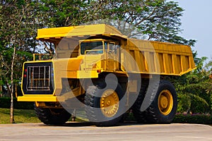 Heavy mining truck in mine and driving along the opencast. Photo of the big mine truck, The career heavy-load super car