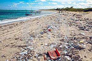 heavy plastic pollution on the beach of tropical sea