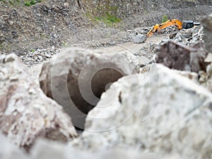 Heavy quarry loader works in open gravel mine