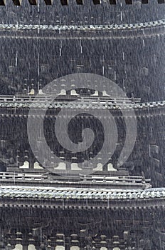 Heavy rain with background of Japanese pagoda.