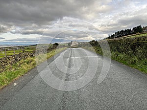 Heavy rain clouds over Low Lane, Queensbury, UK