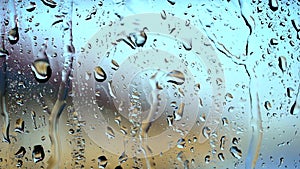 Heavy rain drop on window . Blurry background