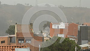 Heavy Rain Over Residential Buildings