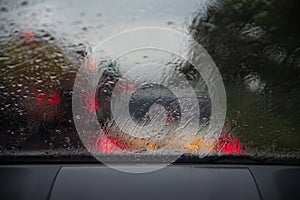 Heavy rain. Raindrop on the window car.