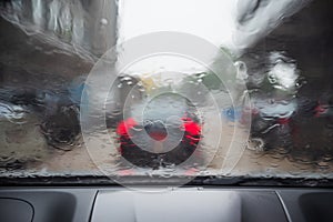 Heavy rain. Raindrop on the window car. Abstract blur bokeh of t