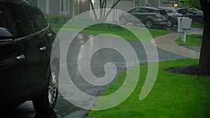 Heavy rain storm. Rain drops falls on the parking car. rain day