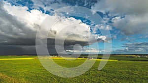 Heavy rainy clouds over the Northern Ireland field